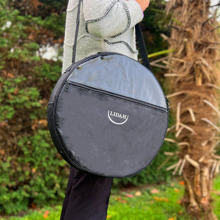 SHamanic Drum Bag being held by woman over her shoulder