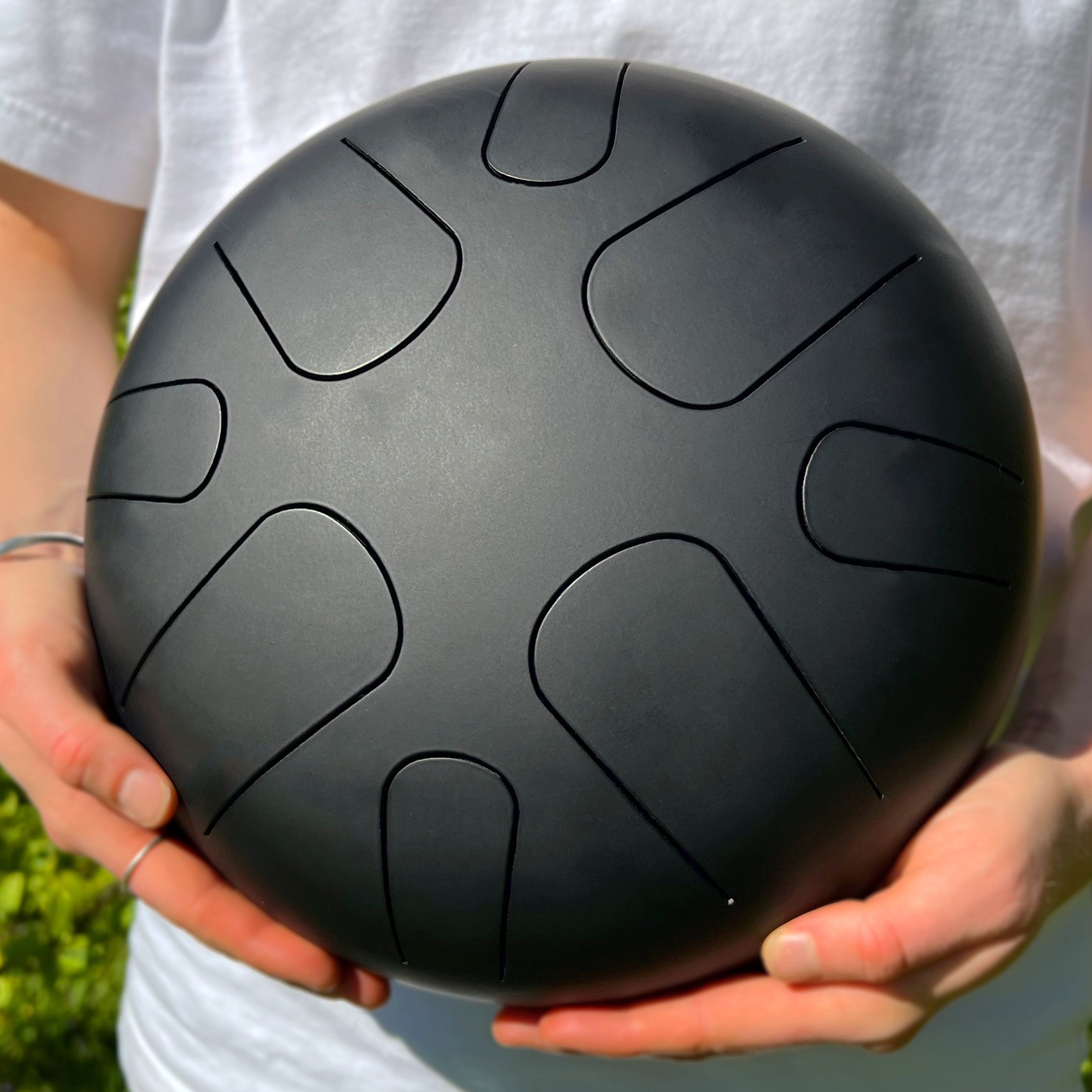 Musician holding LIDAH® Tongue Drum in hands